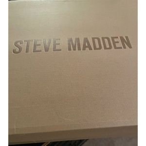 I am selling a pair of Steve Madden, brown over the knee boots, size 8.